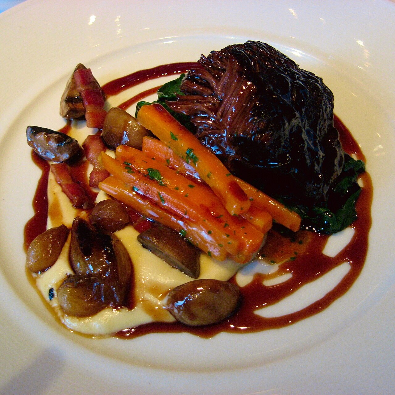 Daube Niçoise — Beef slowly braised with red wine, herbs and vegetables in the traditional Niçois style.